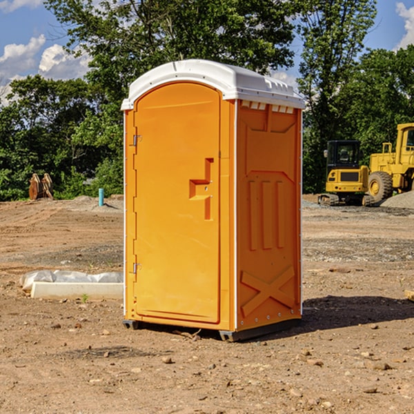 how often are the portable restrooms cleaned and serviced during a rental period in Lowell North Carolina